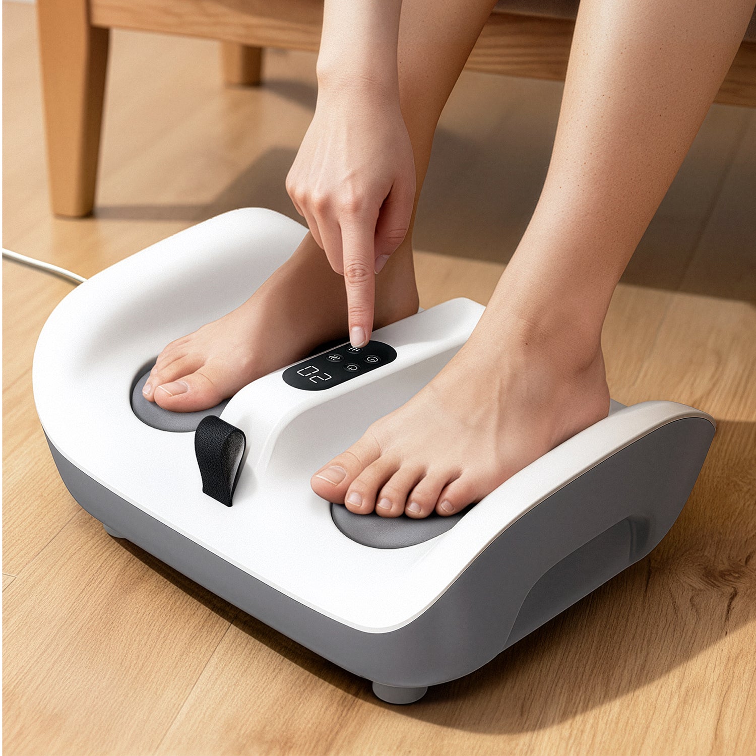 a woman using theneat neatvibe foot massager for soles massage