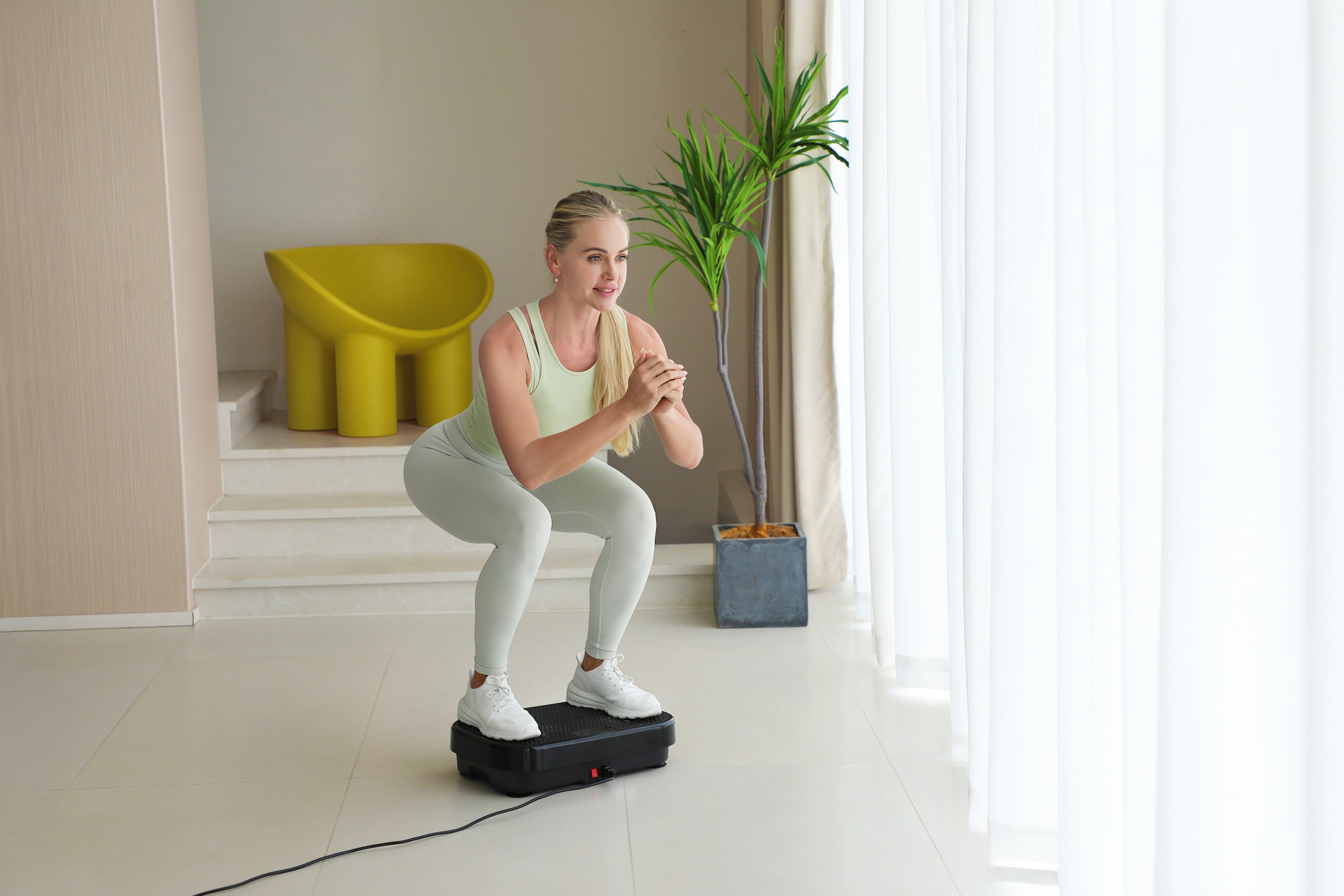 woman-exercising-on-neatshake-at-home