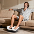 a man using theneat neatvibe foot massager for calf comfort
