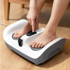 a woman using theneat neatvibe foot massager for soles massage